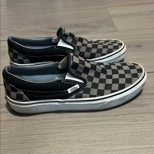 Vans unisex Black Checkered Slip-On Shoes. Men’s size 7, women’s size 8.5.